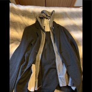 This is a jacket that buttons/sweatshirt combo